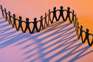 paper-men-joining-together-as-team-union-family-or-network